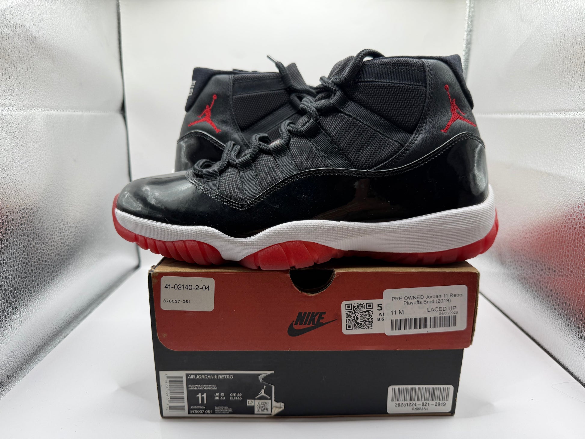 PRE OWNED Jordan 11 Retro Playoffs Bred (2019)